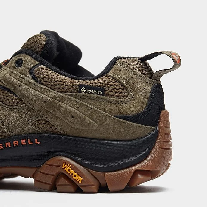 how to choose hiking boots – close-up of black Gore-Tex label on waterproof hiking boot upper