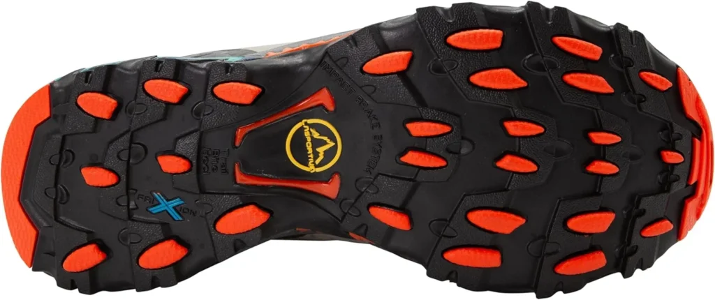 Sole view of La Sportiva Ultra Raptor II Mid GTX boots showing FriXion outsole with Impact Brake System for traction.